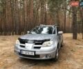 Серый Мицубиси Аутлендер, объемом двигателя 2.38 л и пробегом 230 тыс. км за 8000 $, фото 1 на Automoto.ua