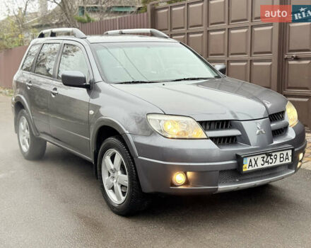 Серый Мицубиси Аутлендер, объемом двигателя 2.4 л и пробегом 240 тыс. км за 6900 $, фото 53 на Automoto.ua