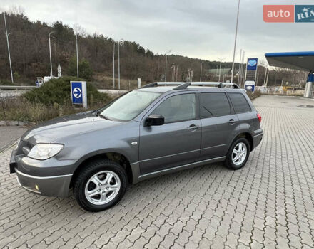 Серый Мицубиси Аутлендер, объемом двигателя 2 л и пробегом 196 тыс. км за 6450 $, фото 44 на Automoto.ua