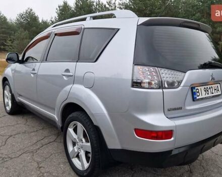 Серый Мицубиси Аутлендер, объемом двигателя 3 л и пробегом 197 тыс. км за 9500 $, фото 1 на Automoto.ua
