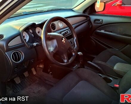 Сірий Міцубісі Аутлендер, об'ємом двигуна 2.4 л та пробігом 211 тис. км за 5000 $, фото 4 на Automoto.ua