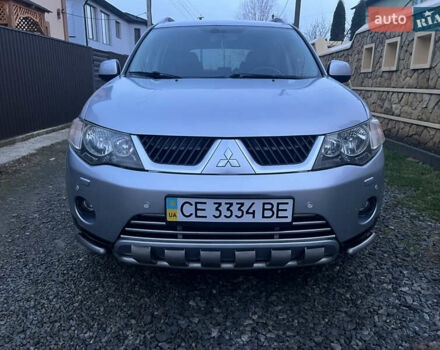 Серый Мицубиси Аутлендер, объемом двигателя 2.4 л и пробегом 236 тыс. км за 7600 $, фото 2 на Automoto.ua