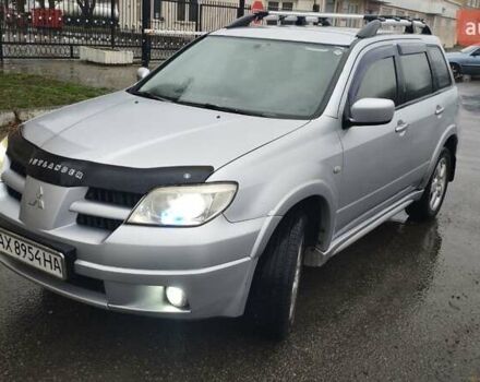 Серый Мицубиси Аутлендер, объемом двигателя 2.38 л и пробегом 204 тыс. км за 6100 $, фото 7 на Automoto.ua