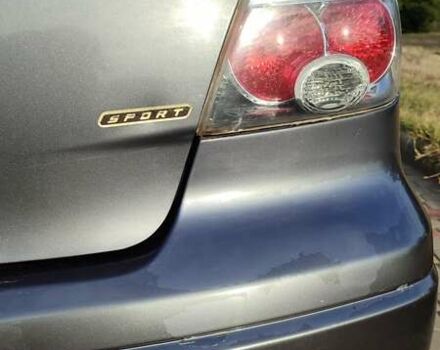 Серый Мицубиси Аутлендер, объемом двигателя 2.38 л и пробегом 189 тыс. км за 7600 $, фото 4 на Automoto.ua