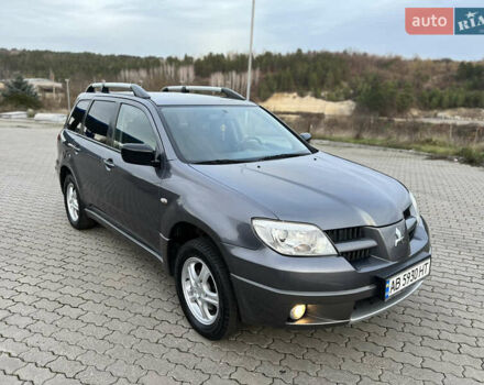 Серый Мицубиси Аутлендер, объемом двигателя 2 л и пробегом 196 тыс. км за 6450 $, фото 3 на Automoto.ua