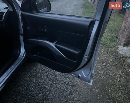 Серый Мицубиси Аутлендер, объемом двигателя 2.4 л и пробегом 236 тыс. км за 7600 $, фото 18 на Automoto.ua