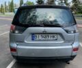 Серый Мицубиси Аутлендер, объемом двигателя 2.36 л и пробегом 335 тыс. км за 9000 $, фото 13 на Automoto.ua