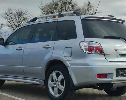 Сірий Міцубісі Аутлендер, об'ємом двигуна 2.4 л та пробігом 170 тис. км за 6400 $, фото 4 на Automoto.ua