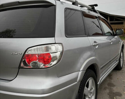 Серый Мицубиси Аутлендер, объемом двигателя 2.38 л и пробегом 238 тыс. км за 7450 $, фото 17 на Automoto.ua