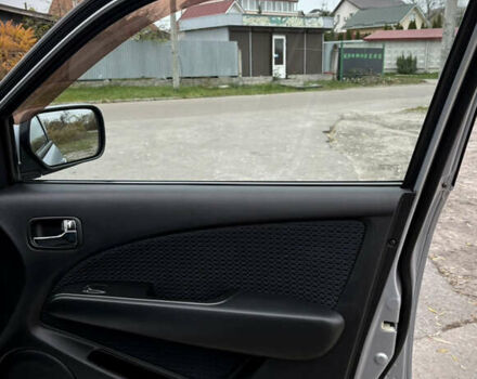 Серый Мицубиси Аутлендер, объемом двигателя 2.38 л и пробегом 238 тыс. км за 7450 $, фото 34 на Automoto.ua