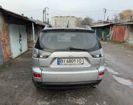 Серый Мицубиси Аутлендер, объемом двигателя 2.4 л и пробегом 330 тыс. км за 9000 $, фото 6 на Automoto.ua