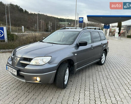 Серый Мицубиси Аутлендер, объемом двигателя 2 л и пробегом 196 тыс. км за 6450 $, фото 17 на Automoto.ua