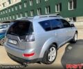 Серый Мицубиси Аутлендер, объемом двигателя 2.4 л и пробегом 220 тыс. км за 7999 $, фото 1 на Automoto.ua