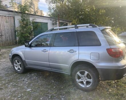Серый Мицубиси Аутлендер, объемом двигателя 2 л и пробегом 190 тыс. км за 5300 $, фото 1 на Automoto.ua