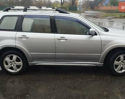 Серый Мицубиси Аутлендер, объемом двигателя 2.38 л и пробегом 204 тыс. км за 6100 $, фото 5 на Automoto.ua
