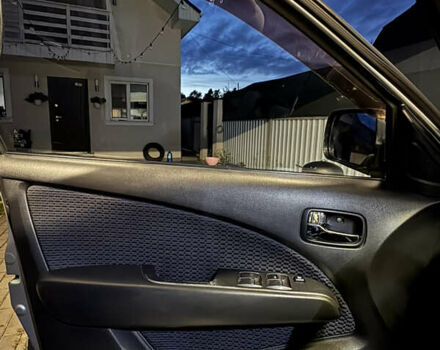 Серый Мицубиси Аутлендер, объемом двигателя 2.38 л и пробегом 238 тыс. км за 7450 $, фото 55 на Automoto.ua