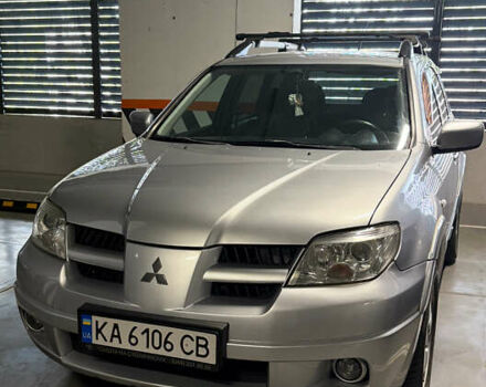 Серый Мицубиси Аутлендер, объемом двигателя 2.38 л и пробегом 238 тыс. км за 7450 $, фото 49 на Automoto.ua