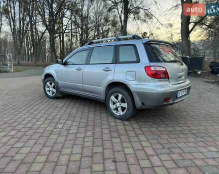 Серый Мицубиси Аутлендер, объемом двигателя 2 л и пробегом 415 тыс. км за 4699 $, фото 1 на Automoto.ua