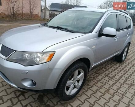 Серый Мицубиси Аутлендер, объемом двигателя 2 л и пробегом 332 тыс. км за 7650 $, фото 4 на Automoto.ua