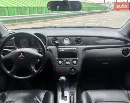 Серый Мицубиси Аутлендер, объемом двигателя 2.4 л и пробегом 245 тыс. км за 6790 $, фото 12 на Automoto.ua