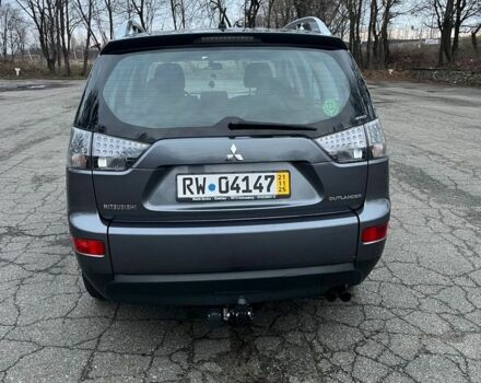 Серый Мицубиси Аутлендер, объемом двигателя 2 л и пробегом 258 тыс. км за 5000 $, фото 3 на Automoto.ua