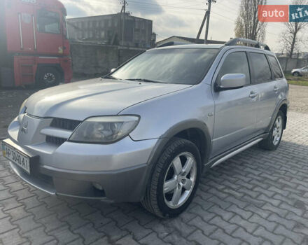 Сірий Міцубісі Аутлендер, об'ємом двигуна 2.4 л та пробігом 166 тис. км за 6700 $, фото 2 на Automoto.ua