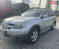 Сірий Міцубісі Аутлендер, об'ємом двигуна 2.4 л та пробігом 166 тис. км за 6700 $, фото 2 на Automoto.ua