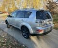 Серый Мицубиси Аутлендер, объемом двигателя 2 л и пробегом 255 тыс. км за 3935 $, фото 3 на Automoto.ua