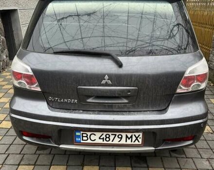 Серый Мицубиси Аутлендер, объемом двигателя 2 л и пробегом 380 тыс. км за 3700 $, фото 1 на Automoto.ua