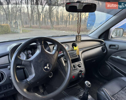 Серый Мицубиси Аутлендер, объемом двигателя 2 л и пробегом 415 тыс. км за 4699 $, фото 8 на Automoto.ua