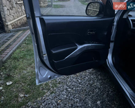 Серый Мицубиси Аутлендер, объемом двигателя 2.4 л и пробегом 236 тыс. км за 7600 $, фото 30 на Automoto.ua