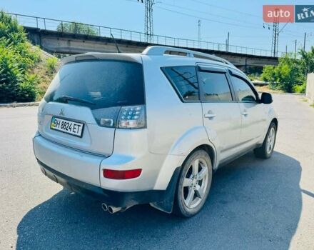 Серый Мицубиси Аутлендер, объемом двигателя 3 л и пробегом 188 тыс. км за 10000 $, фото 4 на Automoto.ua