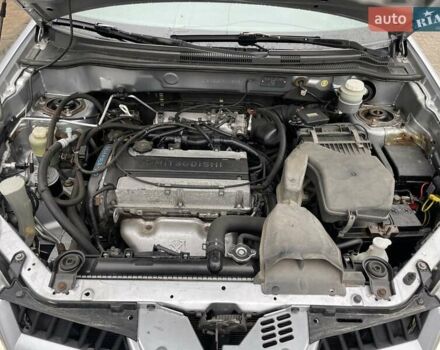 Серый Мицубиси Аутлендер, объемом двигателя 2 л и пробегом 270 тыс. км за 7000 $, фото 13 на Automoto.ua