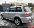 Серый Мицубиси Аутлендер, объемом двигателя 2.4 л и пробегом 280 тыс. км за 5800 $, фото 4 на Automoto.ua