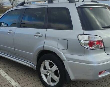 Сірий Міцубісі Аутлендер, об'ємом двигуна 2.4 л та пробігом 170 тис. км за 6400 $, фото 13 на Automoto.ua