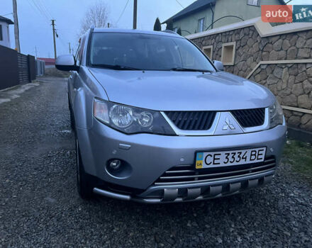 Серый Мицубиси Аутлендер, объемом двигателя 2.4 л и пробегом 236 тыс. км за 7600 $, фото 3 на Automoto.ua
