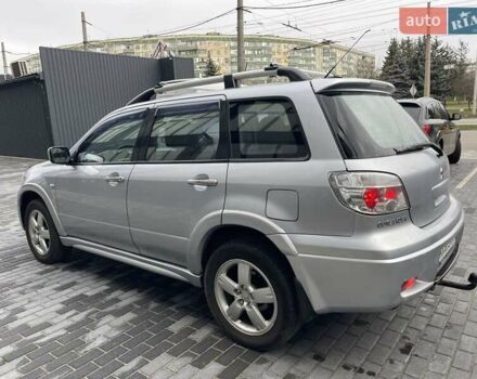 Серый Мицубиси Аутлендер, объемом двигателя 2.38 л и пробегом 280 тыс. км за 5800 $, фото 3 на Automoto.ua