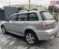 Серый Мицубиси Аутлендер, объемом двигателя 2.38 л и пробегом 280 тыс. км за 5800 $, фото 3 на Automoto.ua