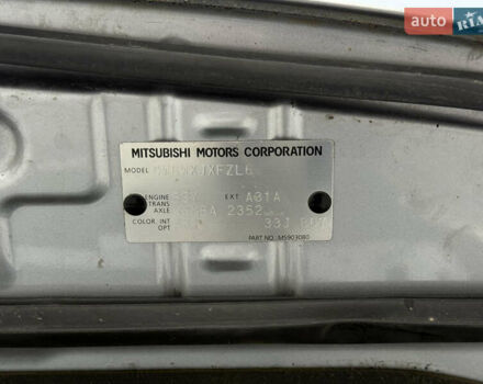 Серый Мицубиси Аутлендер, объемом двигателя 2 л и пробегом 299 тыс. км за 7750 $, фото 47 на Automoto.ua
