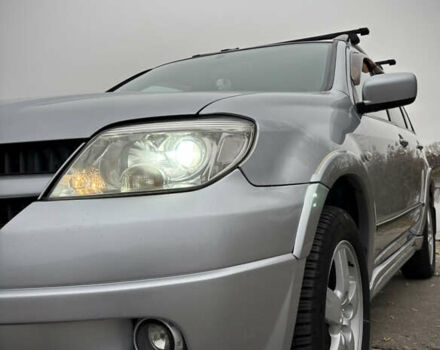 Серый Мицубиси Аутлендер, объемом двигателя 2.38 л и пробегом 238 тыс. км за 7450 $, фото 9 на Automoto.ua