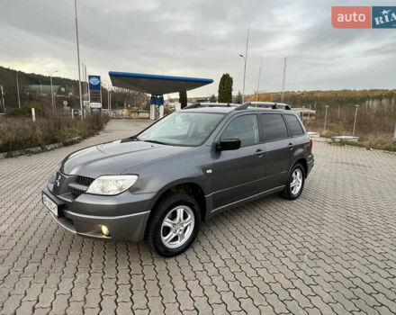 Серый Мицубиси Аутлендер, объемом двигателя 2 л и пробегом 196 тыс. км за 6450 $, фото 37 на Automoto.ua