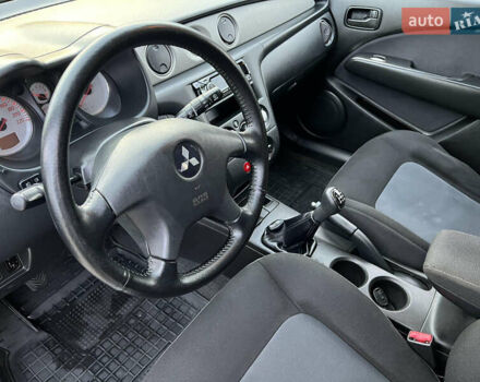 Серый Мицубиси Аутлендер, объемом двигателя 2 л и пробегом 196 тыс. км за 6450 $, фото 18 на Automoto.ua