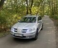 Сірий Міцубісі Аутлендер, об'ємом двигуна 2.4 л та пробігом 307 тис. км за 6700 $, фото 1 на Automoto.ua