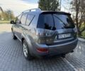 Серый Мицубиси Аутлендер, объемом двигателя 2 л и пробегом 263 тыс. км за 3700 $, фото 4 на Automoto.ua