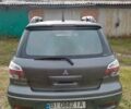 Серый Мицубиси Аутлендер, объемом двигателя 2.4 л и пробегом 226 тыс. км за 6900 $, фото 4 на Automoto.ua