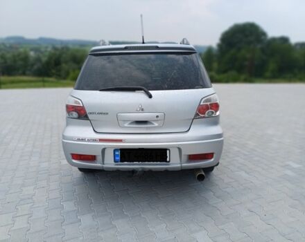 Серый Мицубиси Аутлендер, объемом двигателя 2.4 л и пробегом 243 тыс. км за 6200 $, фото 6 на Automoto.ua