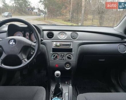 Серый Мицубиси Аутлендер, объемом двигателя 2 л и пробегом 270 тыс. км за 7000 $, фото 15 на Automoto.ua