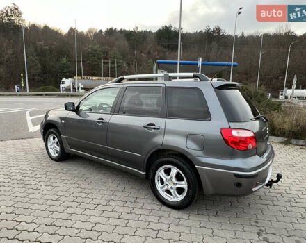 Серый Мицубиси Аутлендер, объемом двигателя 2 л и пробегом 196 тыс. км за 6450 $, фото 6 на Automoto.ua