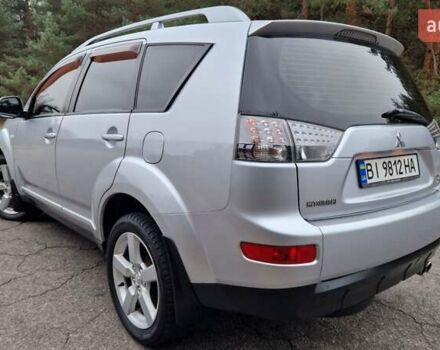 Серый Мицубиси Аутлендер, объемом двигателя 3 л и пробегом 197 тыс. км за 9500 $, фото 2 на Automoto.ua