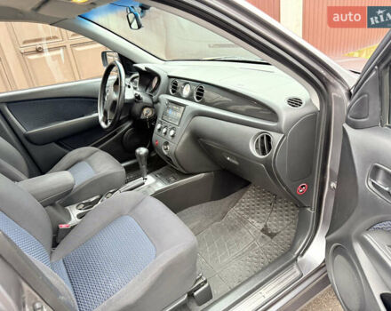 Серый Мицубиси Аутлендер, объемом двигателя 2.4 л и пробегом 240 тыс. км за 6900 $, фото 32 на Automoto.ua